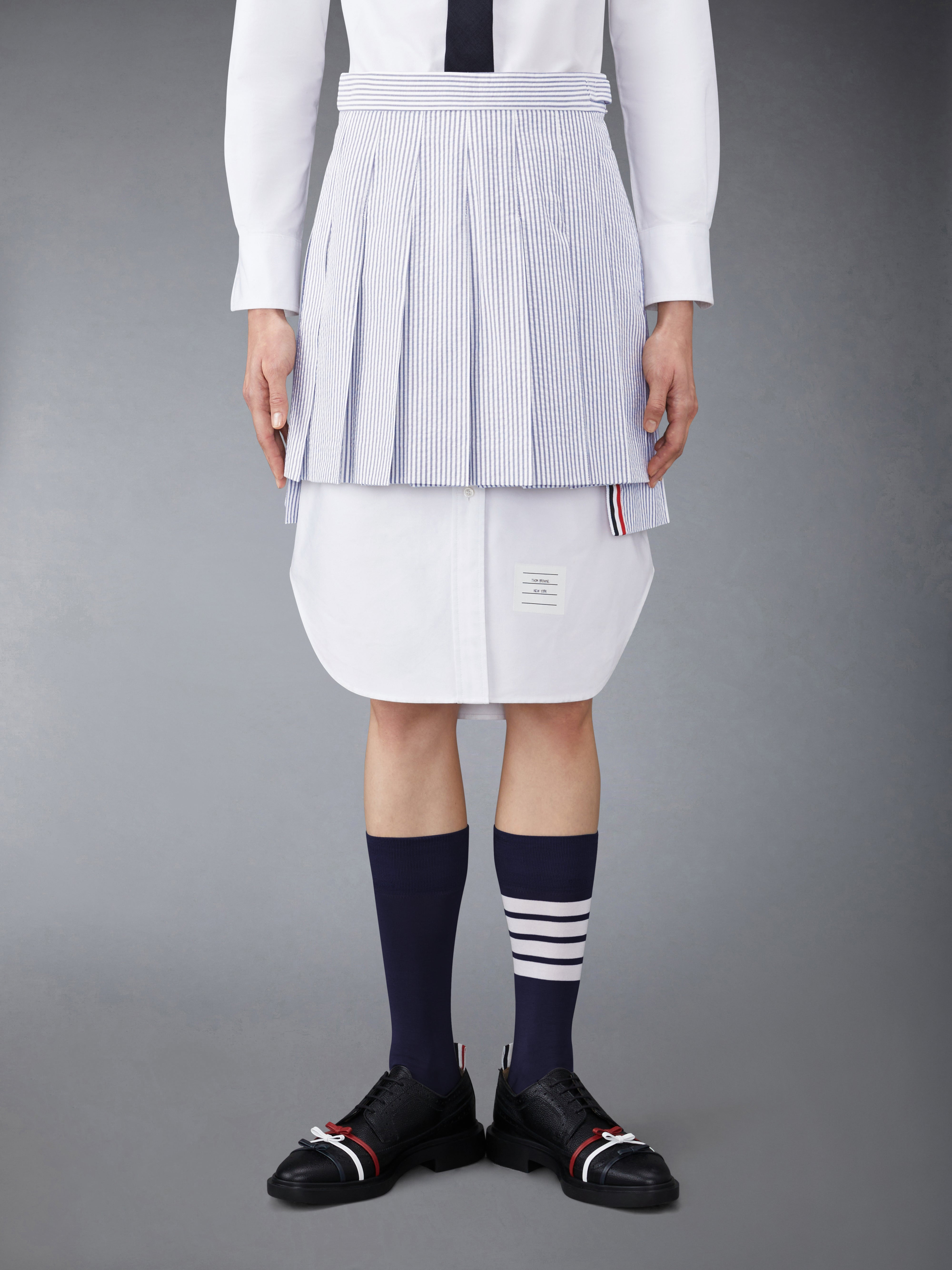 thigh length dropped back pleated skirt in seersucker